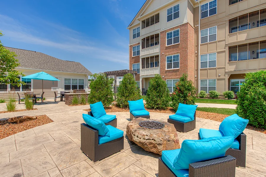Be prepared! Even when the weather is as beautiful as pictured here at Lakeside Apartments of Carmel, something can still go awry and knock out the power unexpectedly. Outdoor patio and grill at Lakeside Apartments of Carmel